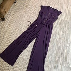 Purple sleeveless jumpsuit with gold detailing
